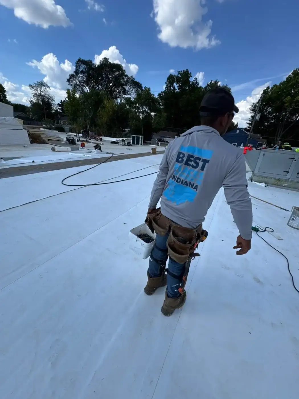 Tarping and dry-in on a Winamac commercial roof
