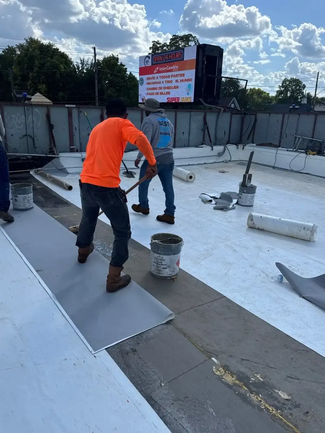 Tarping and dry-in on a Winamac commercial roof